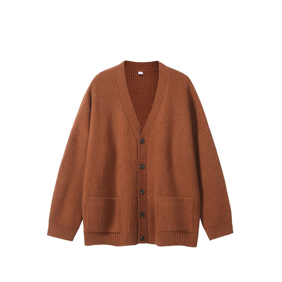 Rust brown ribbed knit button-front cardigan with V-neck and two patch pockets, flat lay front view