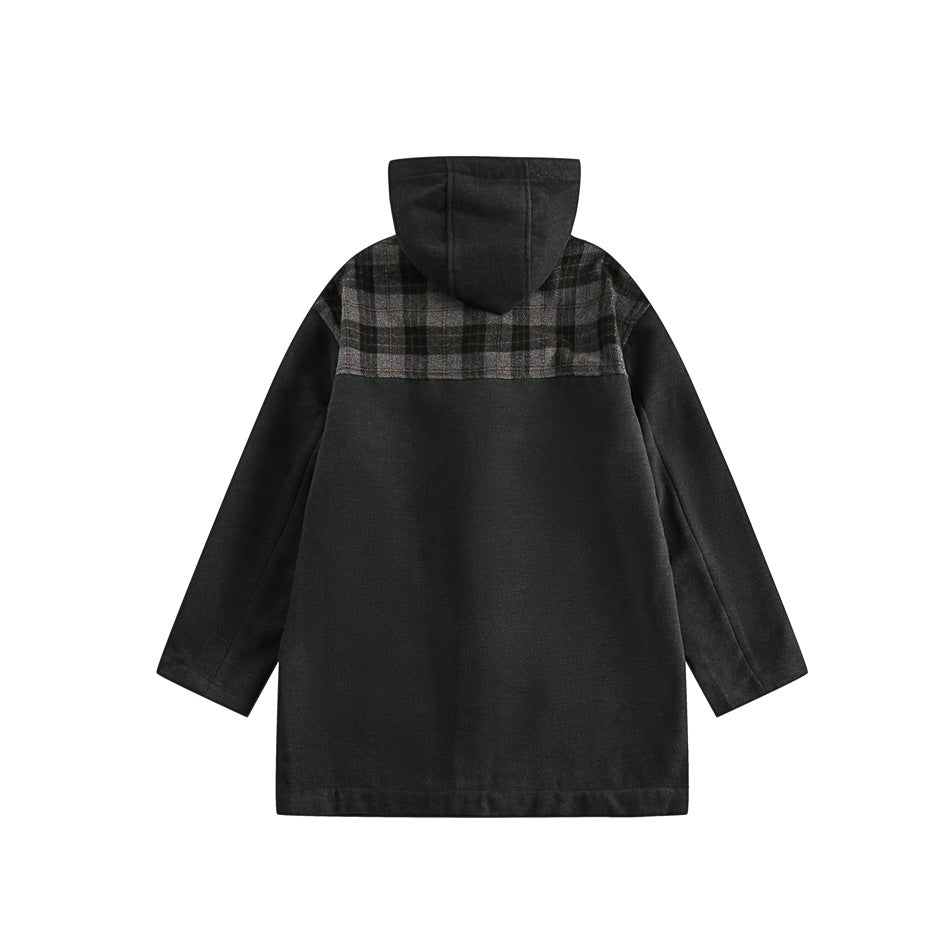 Back of a charcoal hooded coat with a gray-brown plaid panel across the shoulders.
