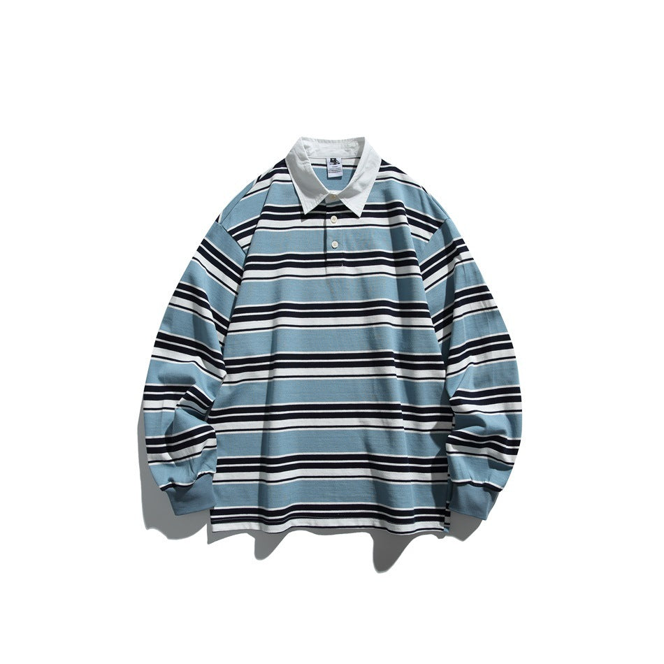 Front view of a long-sleeve rugby shirt with light blue, navy and white stripes, white collar and button placket.
