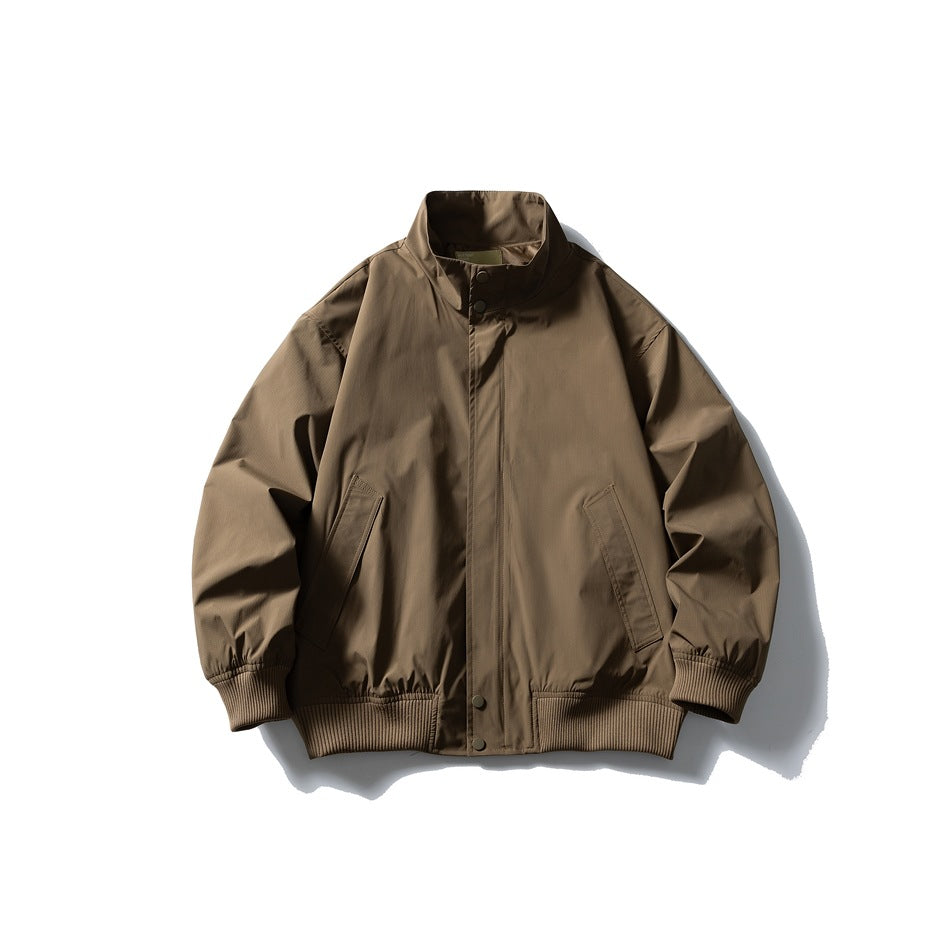 Khaki stand-collar jacket flat lay front view with snap placket, angled pockets and ribbed cuffs and hem