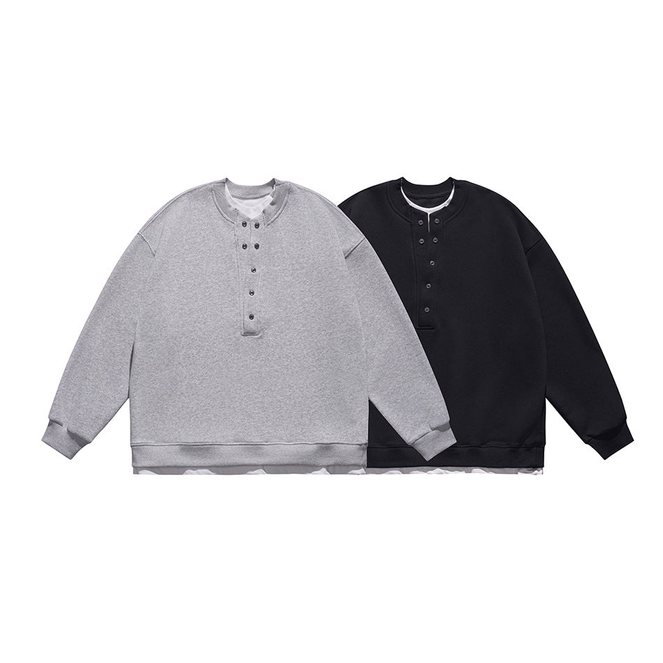 Two long-sleeve crewneck sweatshirts with button plackets, shown in gray and black.