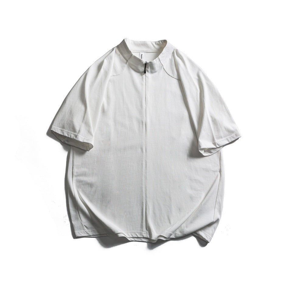 White short-sleeve stand-collar T-shirt with front zip, flat lay