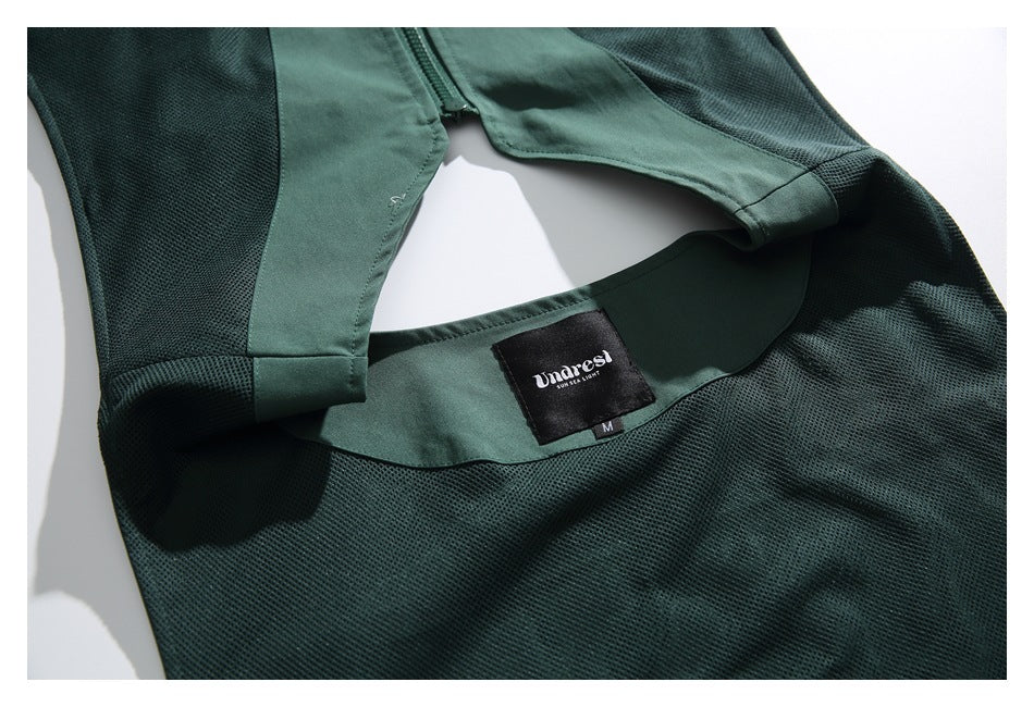 Close-up of the vest's inner mesh, zipper, and sewn-in neck label.