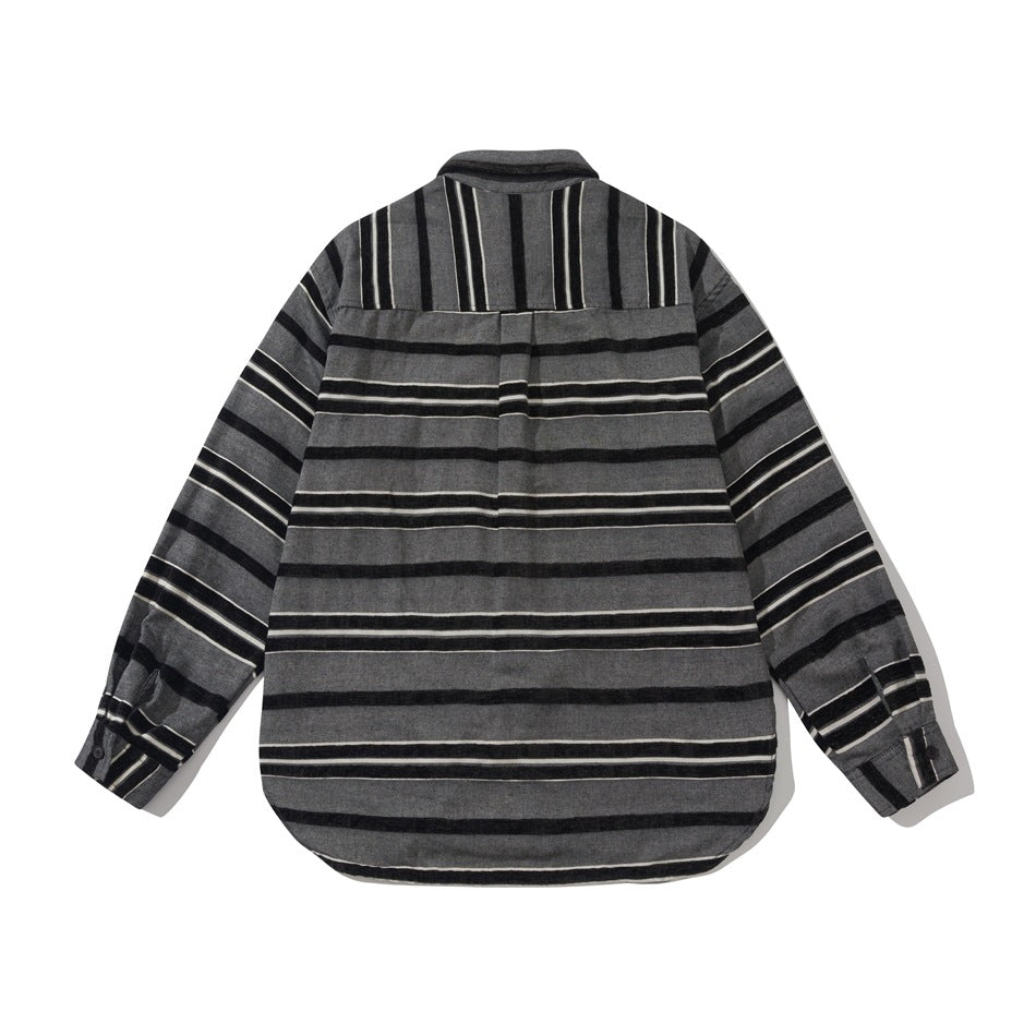 Back view of black and gray striped shirt with vertical-striped yoke and center pleat, flat lay