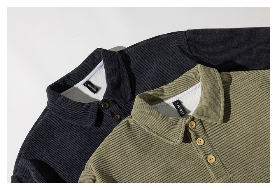 Close-up of charcoal and olive pullover collars and button plackets, with inner neck labels visible.