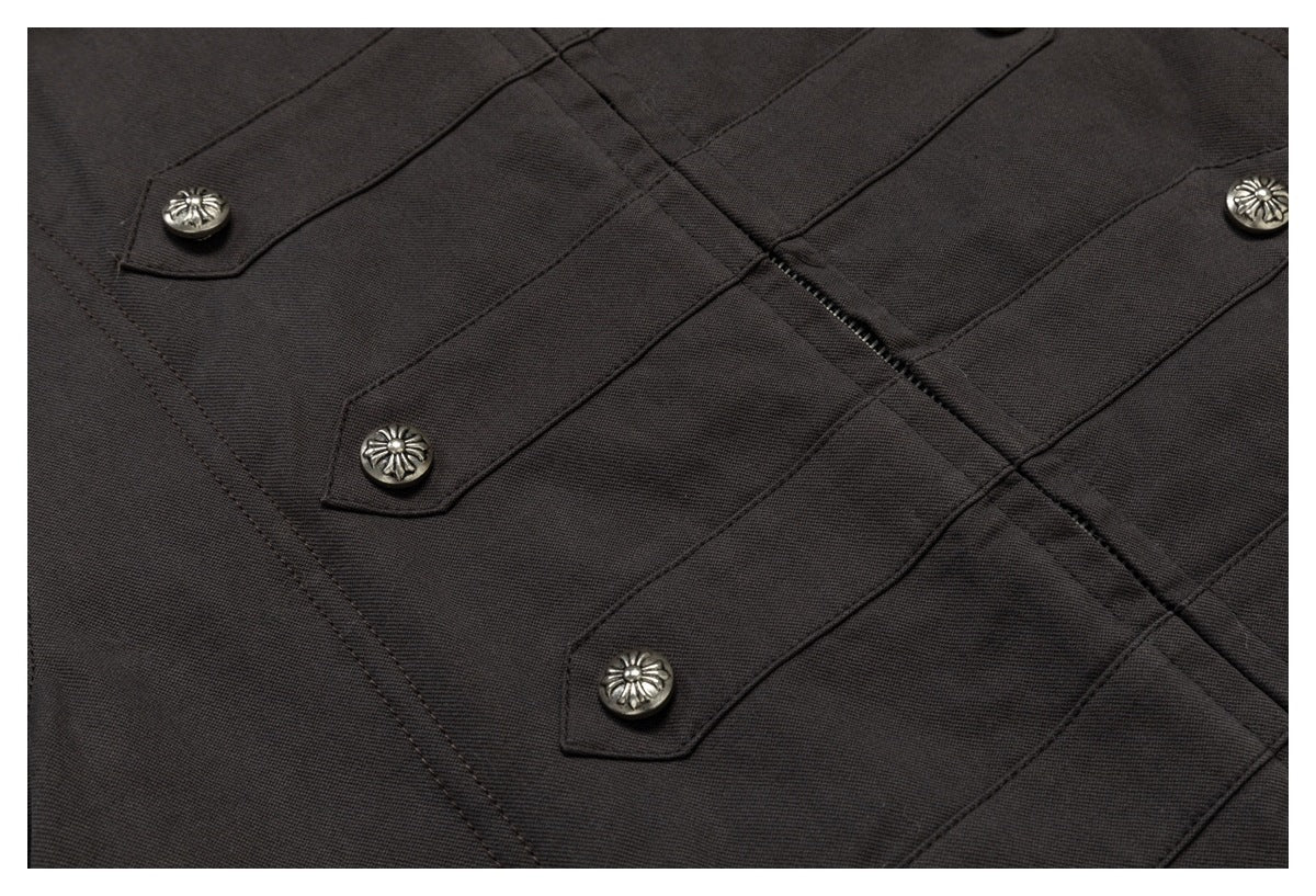 Close-up of the parka's dark front panels and ornate metal buttons.
