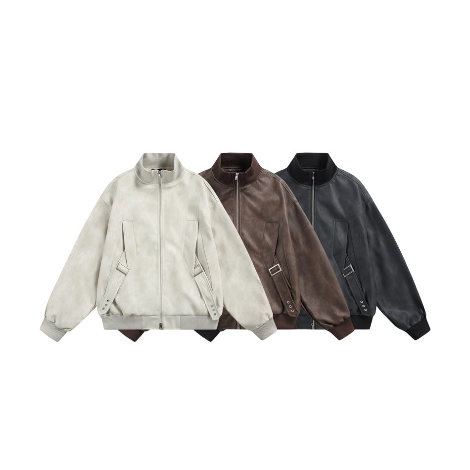 Three zip-front jackets with ribbed collars and cuffs shown together in off-white, brown, and black.