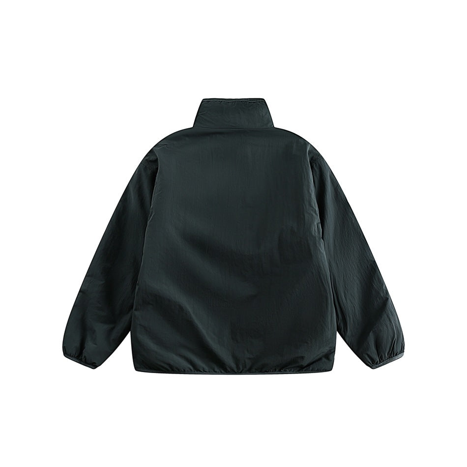 Back view of a dark charcoal jacket with a raised collar, long sleeves, and a plain design.