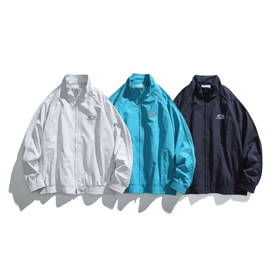 Three zip-up jackets shown side by side in white, turquoise, and dark navy.