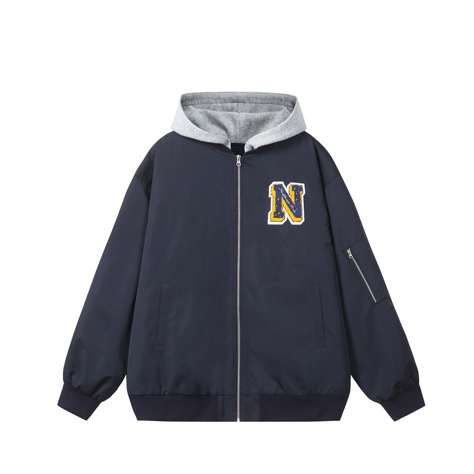 Navy zip-up hooded jacket with gray hood, chenille letter N patch, sleeve zip pocket and ribbed cuffs, front view