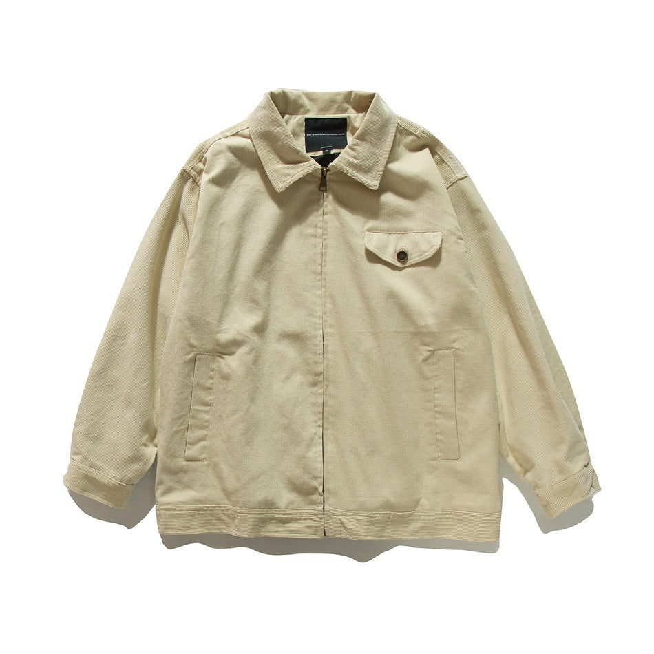 Beige corduroy zip-front jacket with a collar, chest flap pocket and slash pockets, flat lay front view