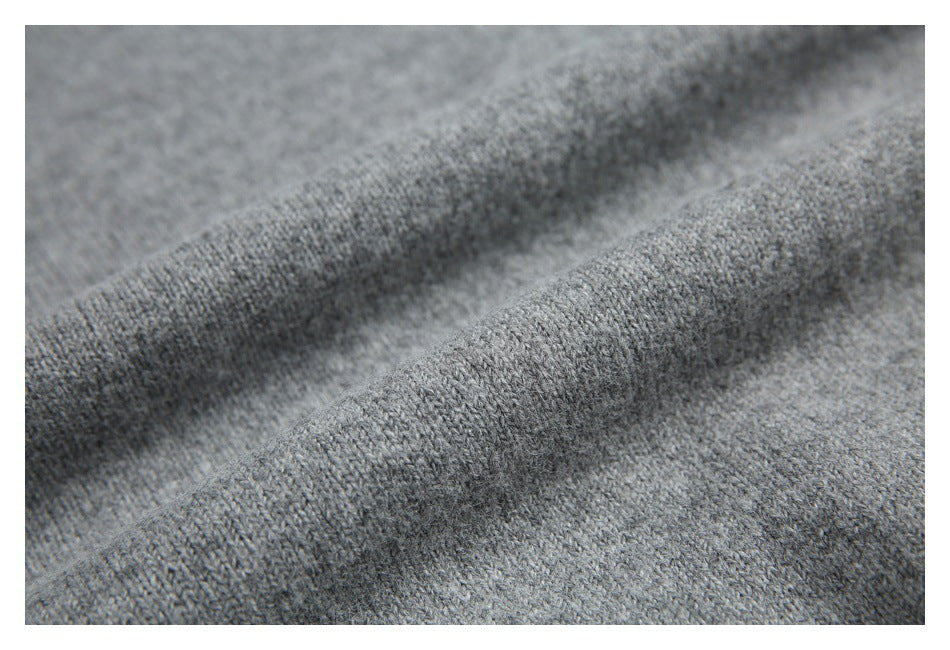 Close-up showing the heather gray knit fabric draped in soft folds.