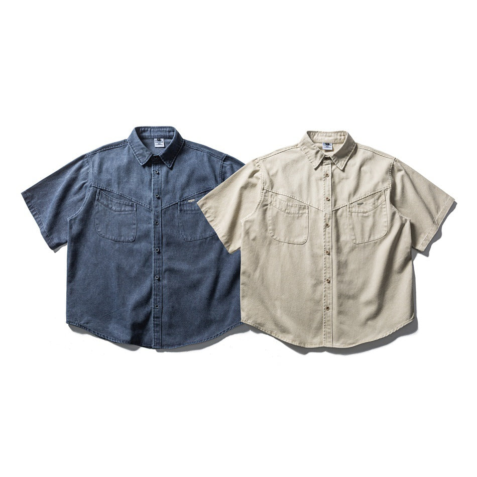 Front views of short-sleeve button-up shirts with two chest pockets, in dark blue and beige.