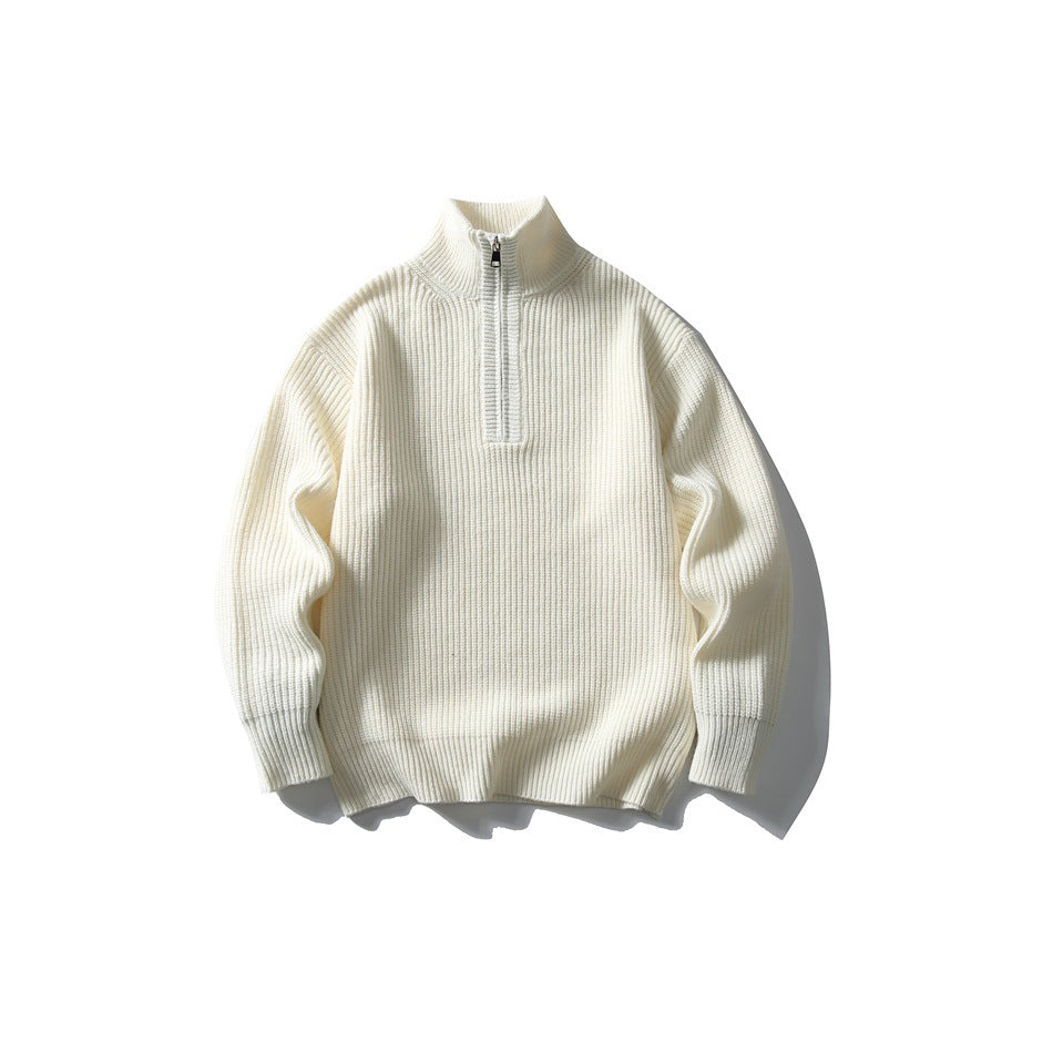 Off-white ribbed knit half-zip sweater with stand collar and gray zipper tape, flat lay front