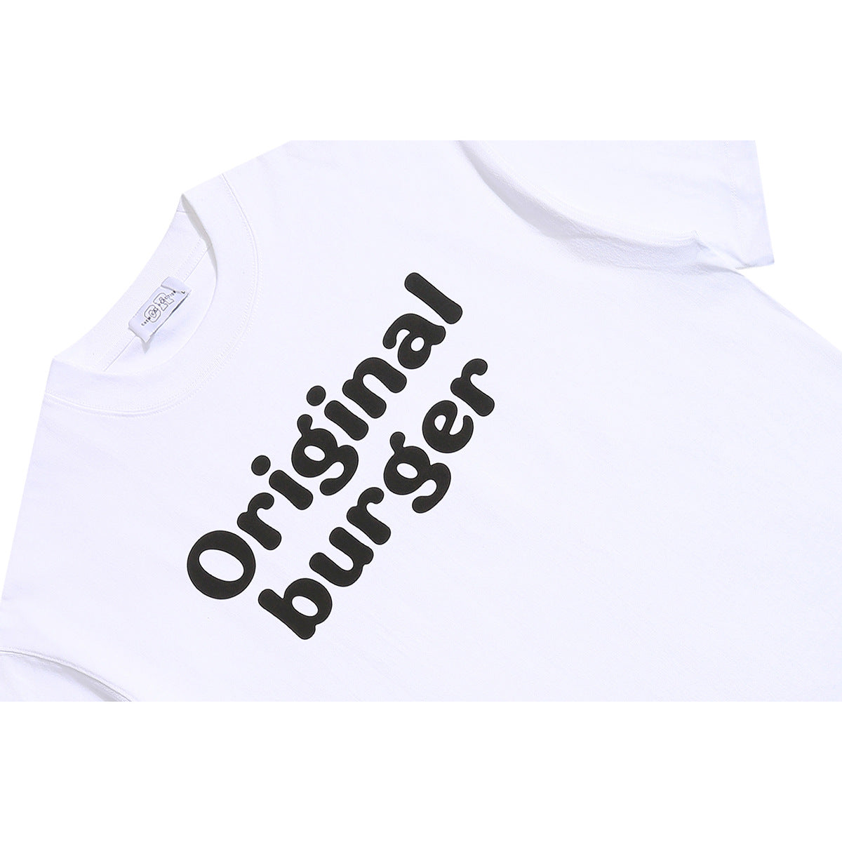 Close-up of a white T-shirt’s black “Original burger” chest print and crew neckline.