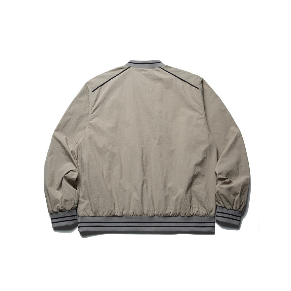 Back view of a beige-gray pullover jacket with raglan piping and striped ribbed collar, cuffs and hem