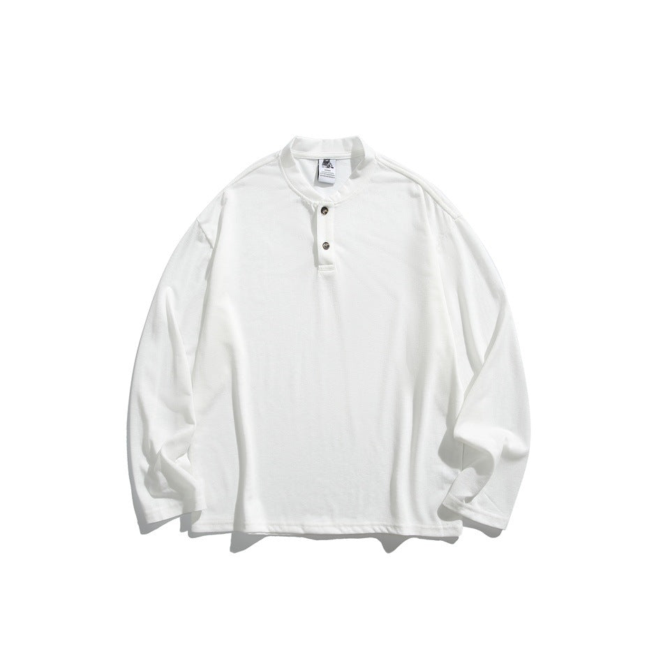 White long-sleeve henley top with stand collar and two buttons, flat lay front view