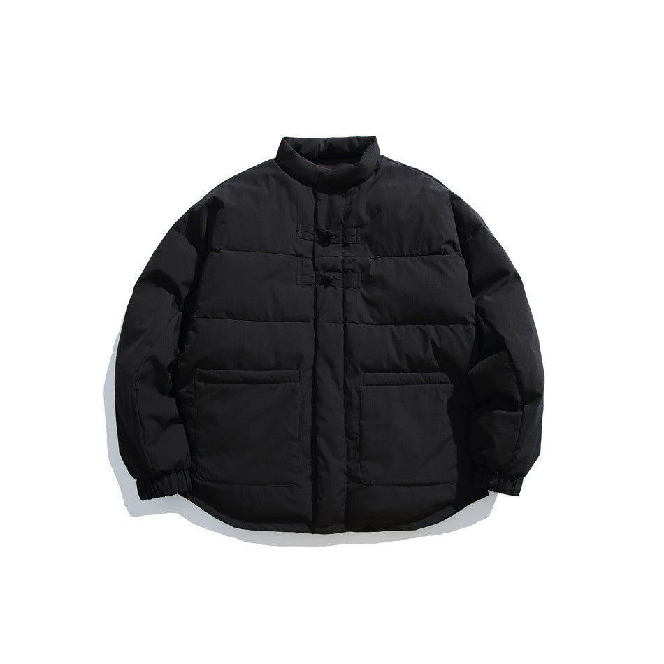 Black stand-collar quilted puffer jacket with two frog knot fasteners and large front patch pockets, flat lay
