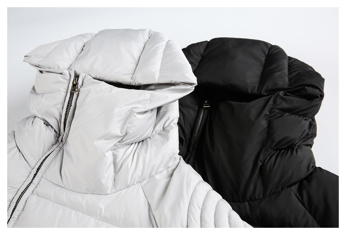 Close view of light gray and black hooded puffer jackets with high collars and front zippers.
