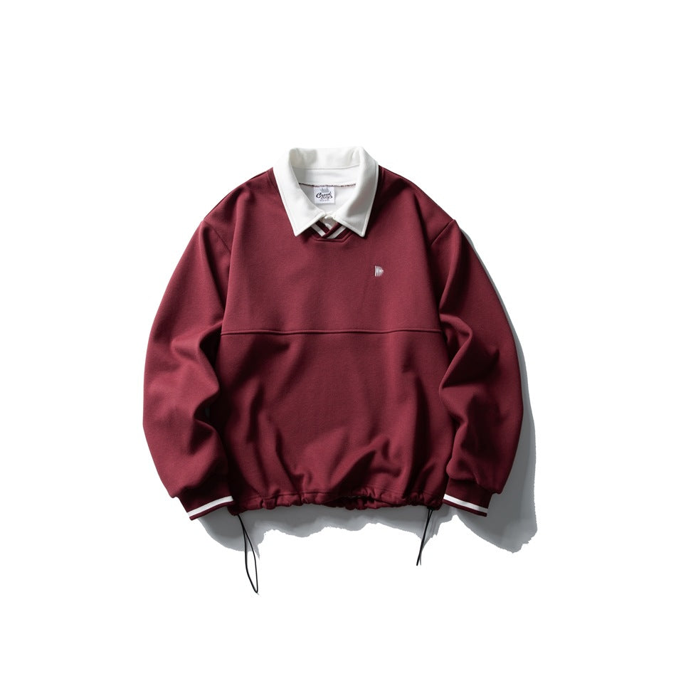 Burgundy pullover sweatshirt with white polo collar, striped cuffs and drawstring hem, flat lay front view