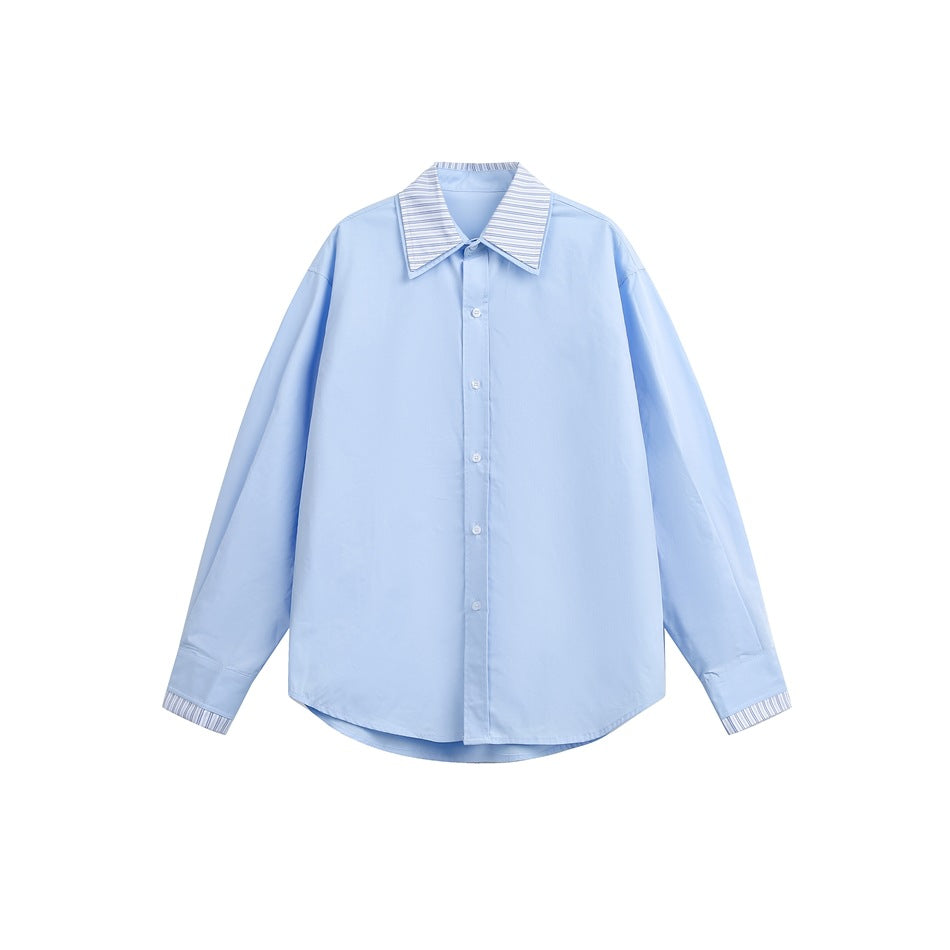Light blue long-sleeve button-up shirt with striped double-layer collar and striped cuff trim, flat lay front view