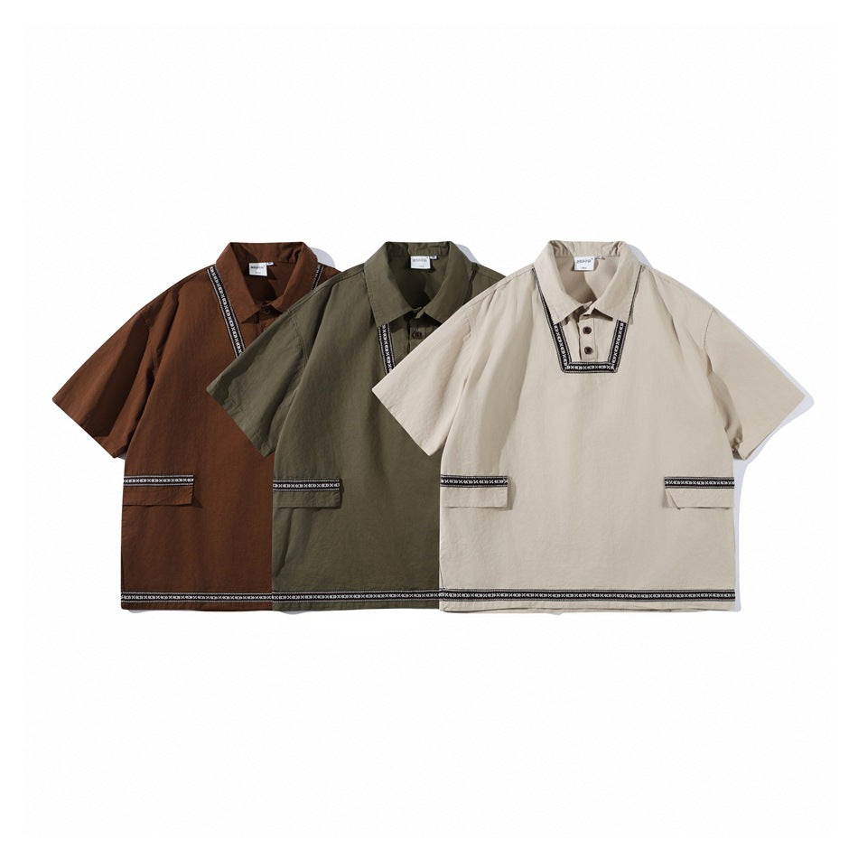 Three short-sleeve collared shirts in brown, olive, and beige, with patterned trim and front pockets.