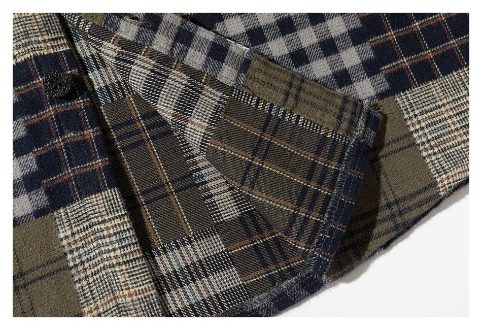 Close-up of the inside seam and plaid fabric on a multicolor shirt.