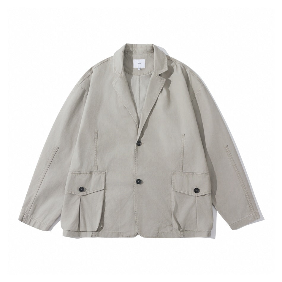 Gray relaxed blazer-style jacket flat lay, front view with notch lapels, two buttons and two large flap pockets