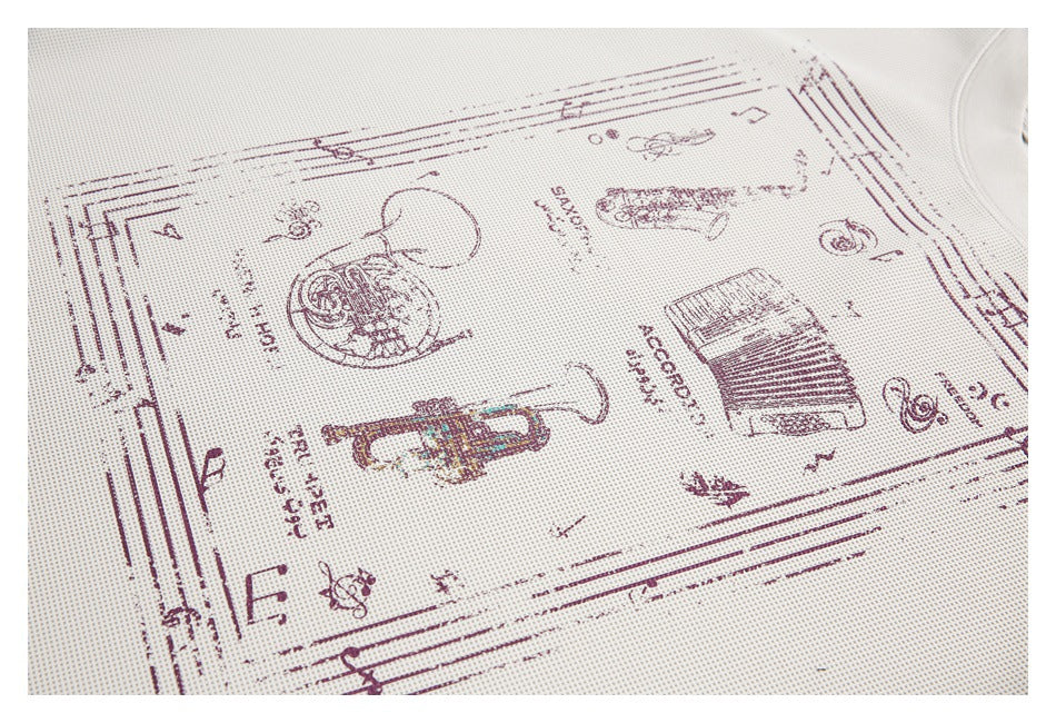 Close-up of the off-white textured shirt's burgundy vintage-style illustrated chest graphic.