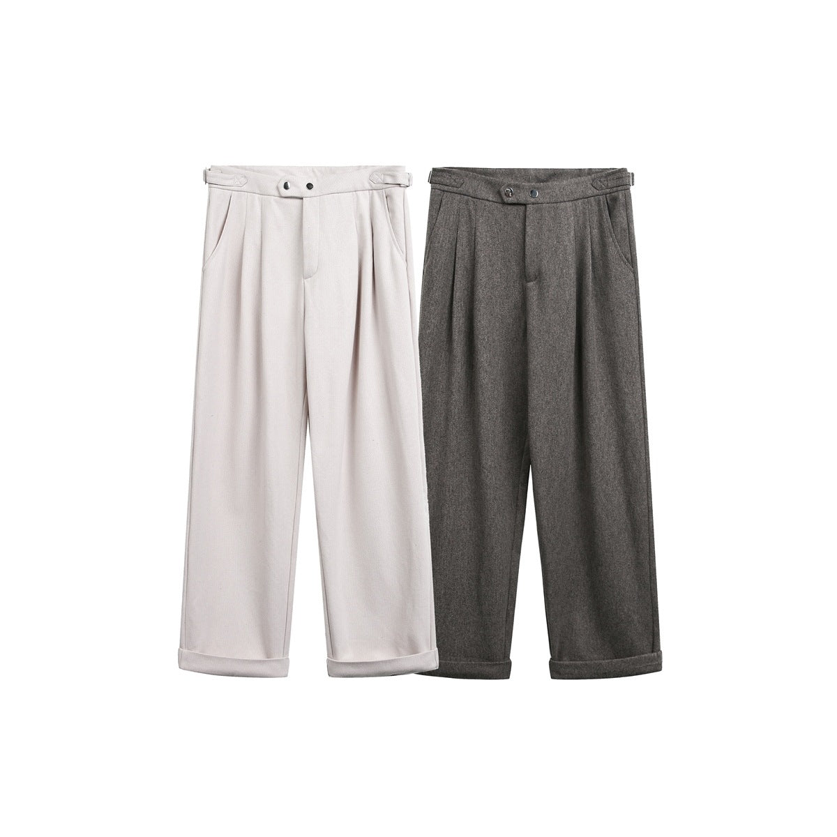 Front view of wide-leg pleated trousers in ivory and charcoal, with adjustable waist tabs and cuffed hems.