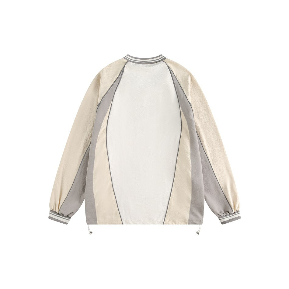Back view of a cream pullover with a white center panel, gray side panels, and striped trim.