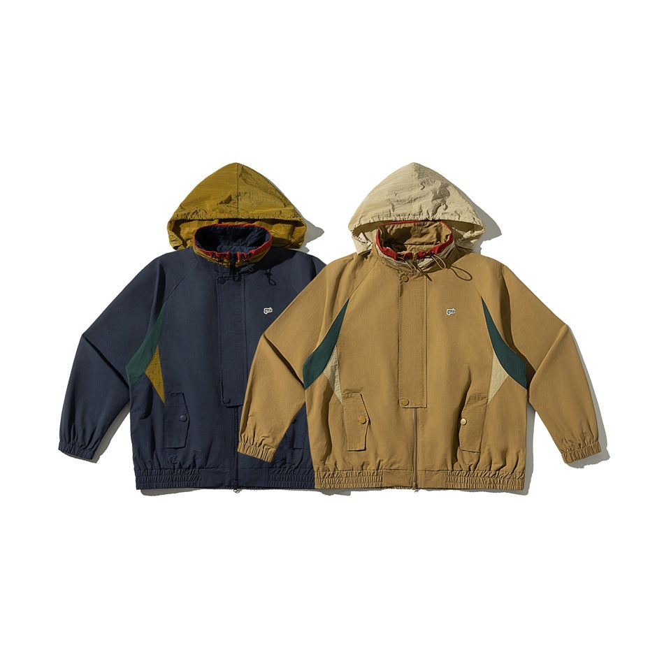 Two hooded jackets shown side by side: one navy with green accents and one tan with dark teal accents.
