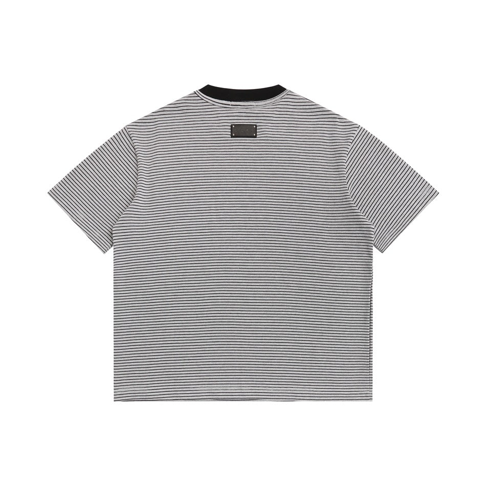 Back view of light gray striped T-shirt with black collar and small dark plaque patch below the neck