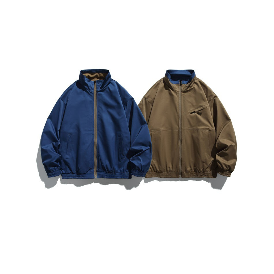 Front views of zip-up jackets in navy and brown, with stand collars and gathered hems.