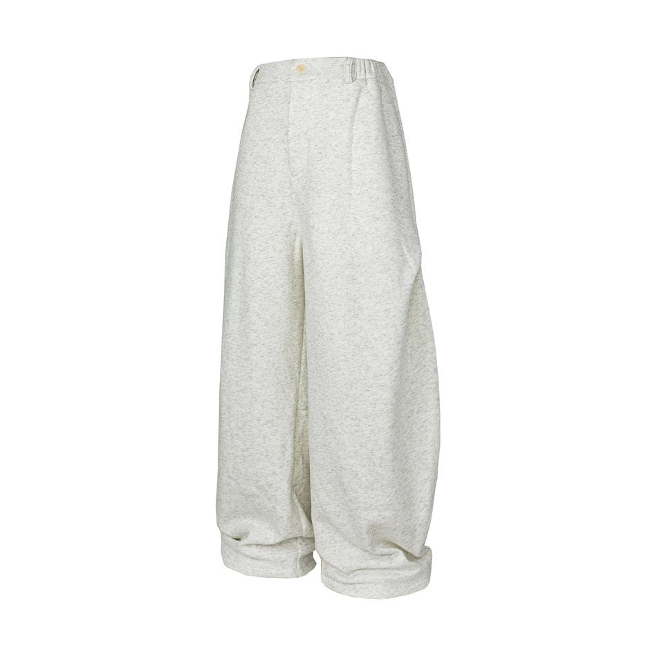 White-gray heathered wide-leg pants with elastic waist and button, shown angled on a white background