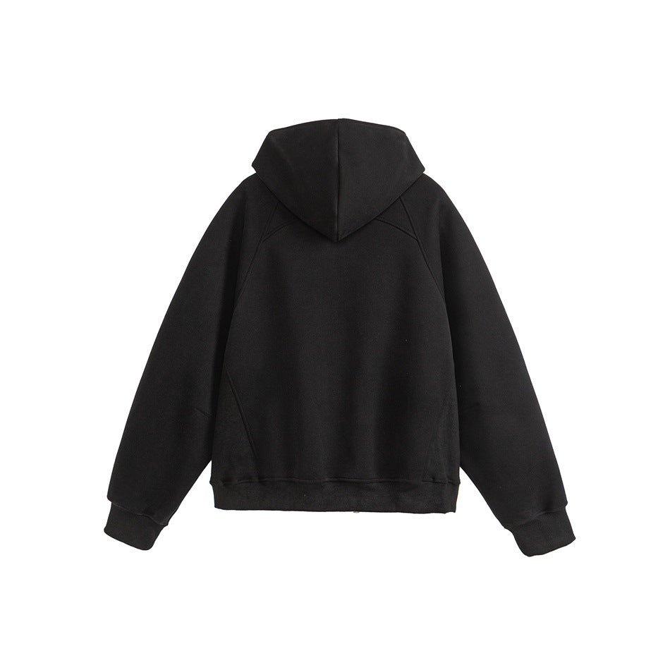 Back view of a plain black hooded sweatshirt with long sleeves, ribbed cuffs and hem, laid flat on white.