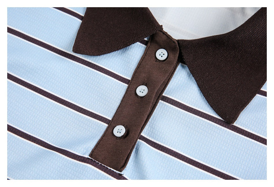 Close-up of the dark brown collar and three-button placket against light blue fabric with dark stripes.