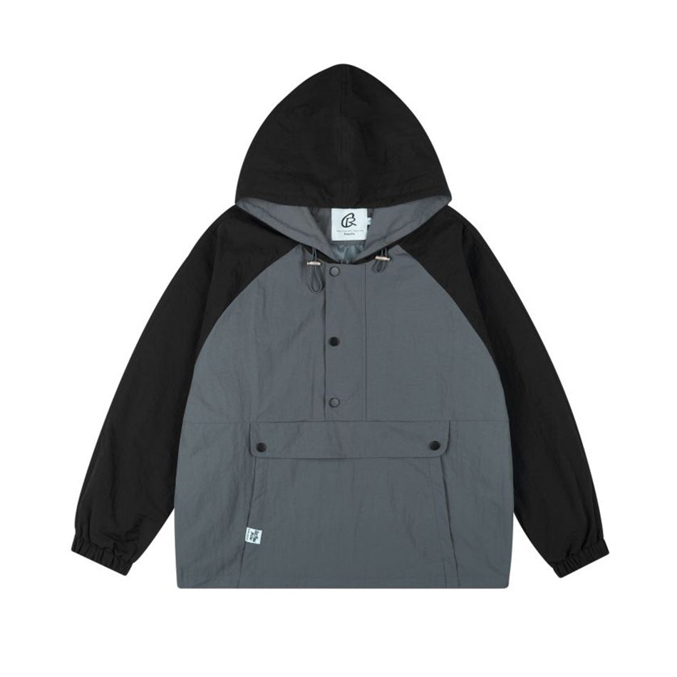 Gray and black color-block hooded anorak jacket, front view, with snap placket, pouch pocket and elastic cuffs