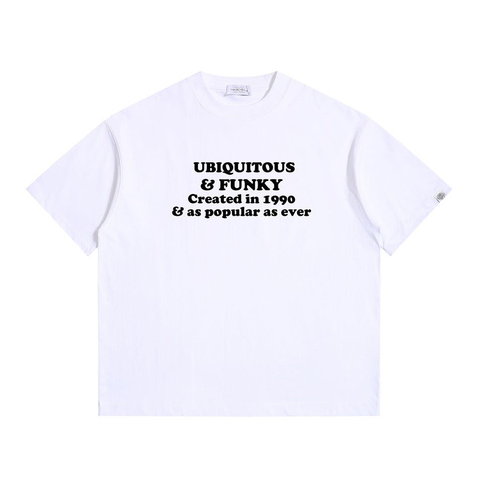 White short-sleeve T-shirt with black "Ubiquitous & Funky" slogan print on the chest, flat lay