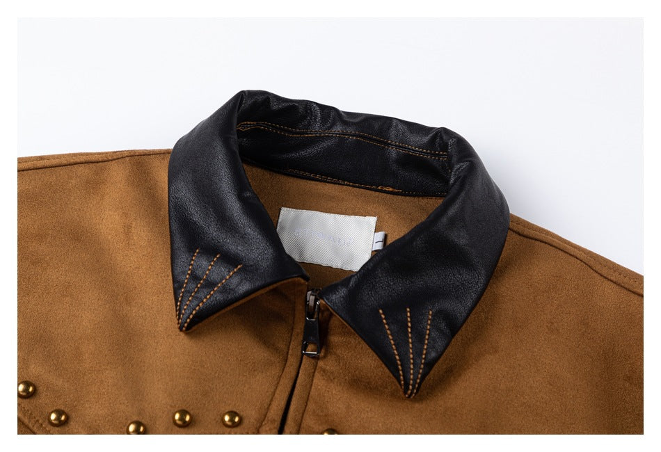 Close-up of the jacket's black stitched collar, rust-brown body, zipper, and gold stud trim.