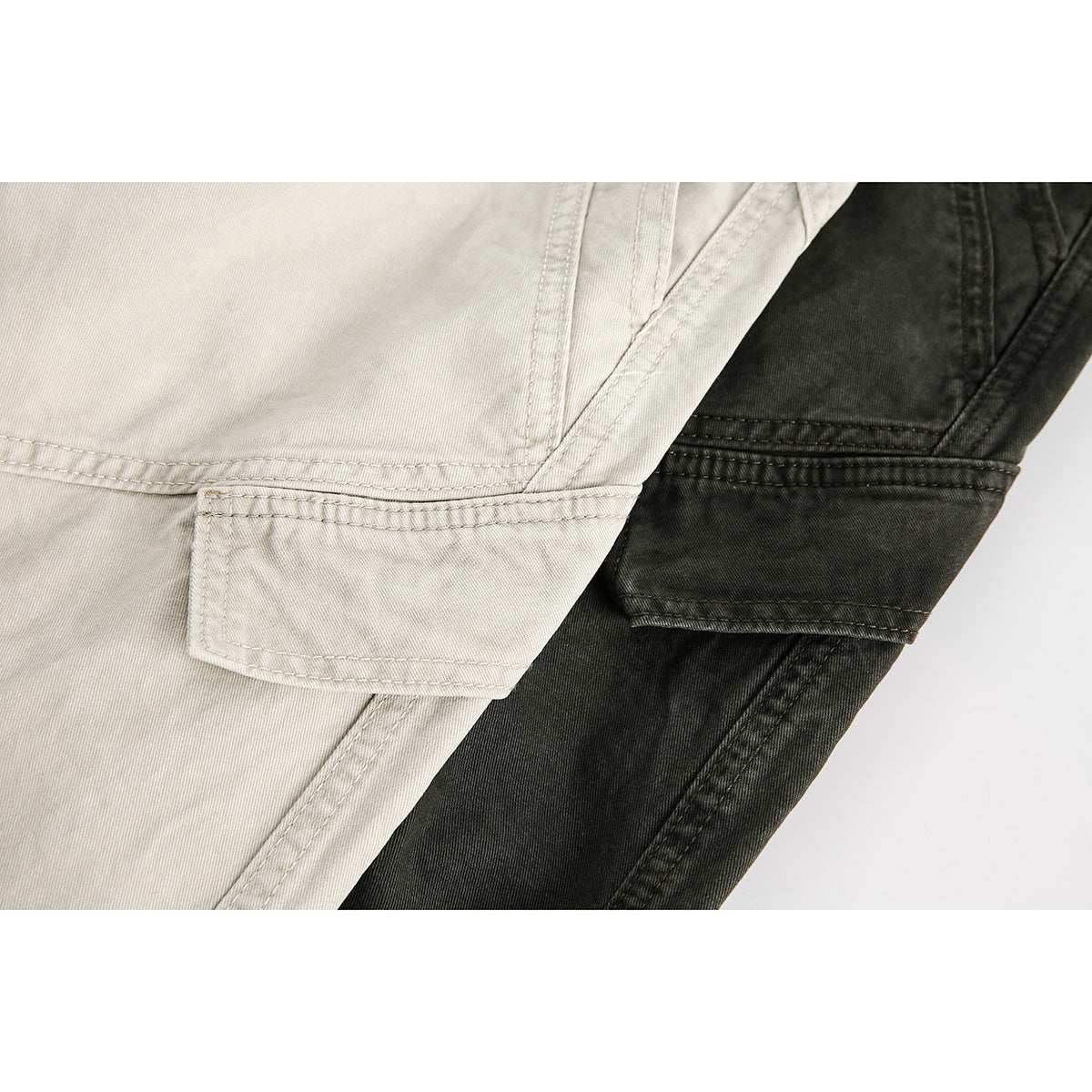 Close-up of beige and charcoal pants showing stitched rear pockets and fabric details.