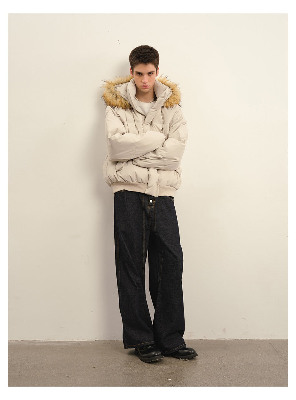 Model wearing a light beige puffer jacket with a tan fur-trimmed hood, facing forward.