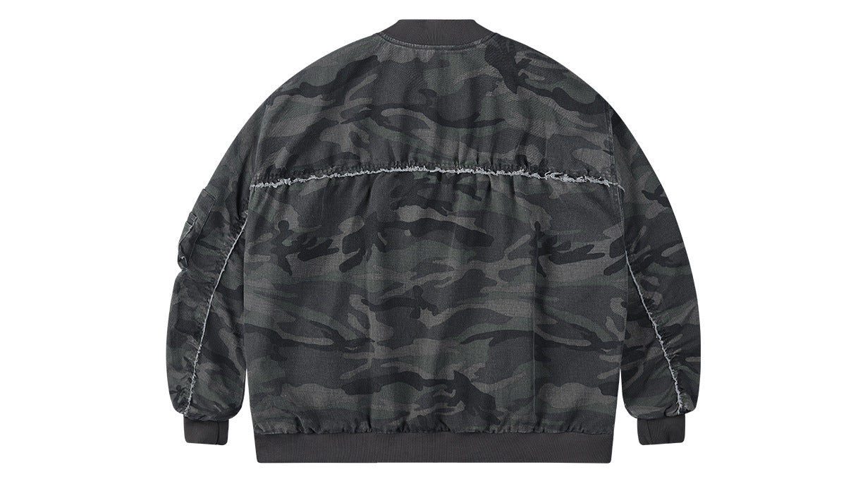 Back view of a charcoal and olive camouflage jacket with dark ribbed collar, cuffs and hem, plus contrast seams.