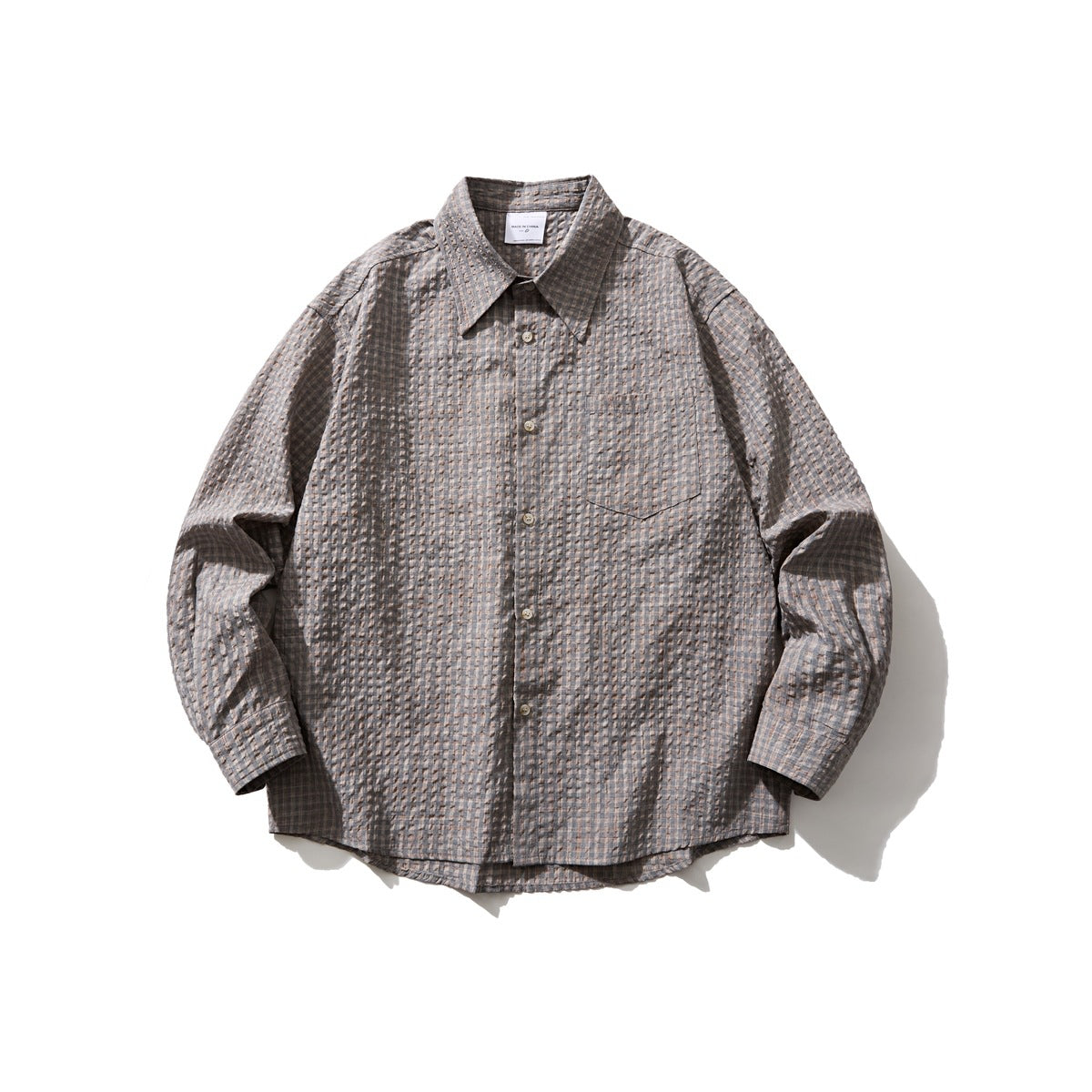 Gray check long-sleeve button-up shirt with chest pocket, flat lay front view