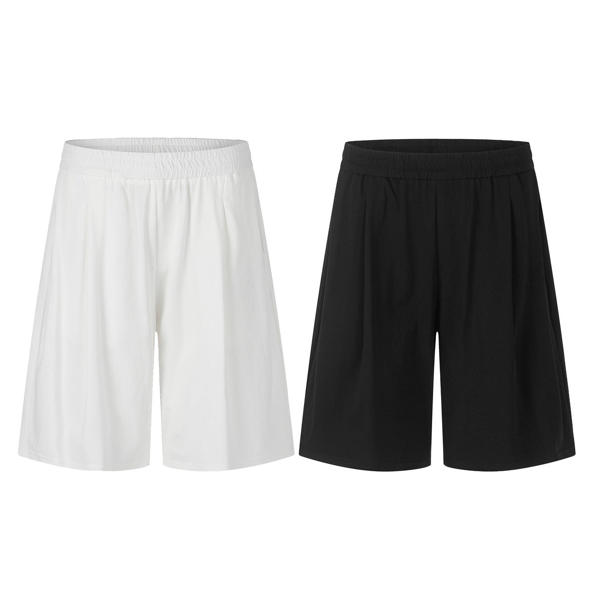 Loose shorts shown side by side in white and black, each with a gathered elastic waistband.