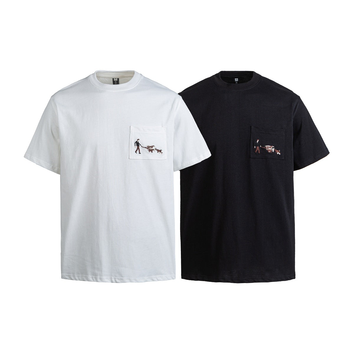 Front view of white and black short-sleeve crew-neck T-shirts, each with a chest pocket and small embroidered scene.