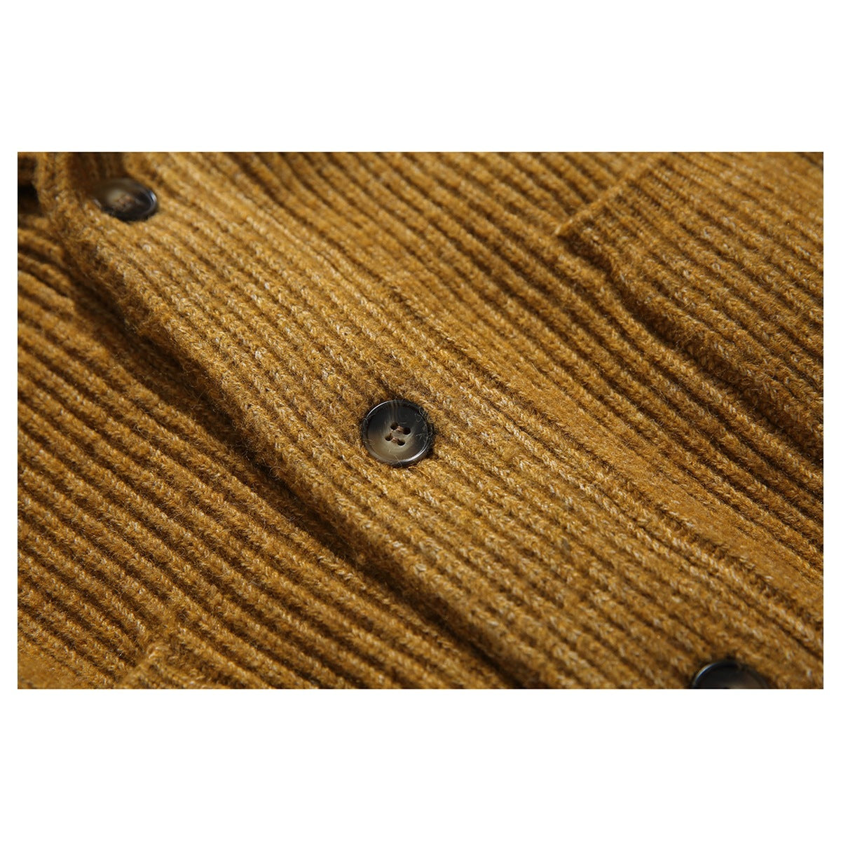 Close-up showing the mustard-brown ribbed knit and dark buttons on the cardigan front.