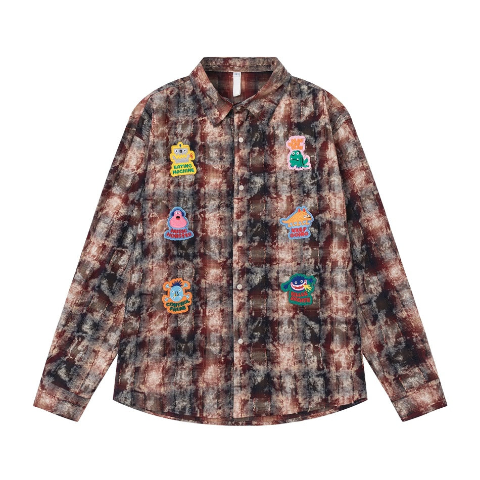 Wine red and dark multicolor tie-dye plaid long-sleeve shirt with six embroidered monster patches, flat front view