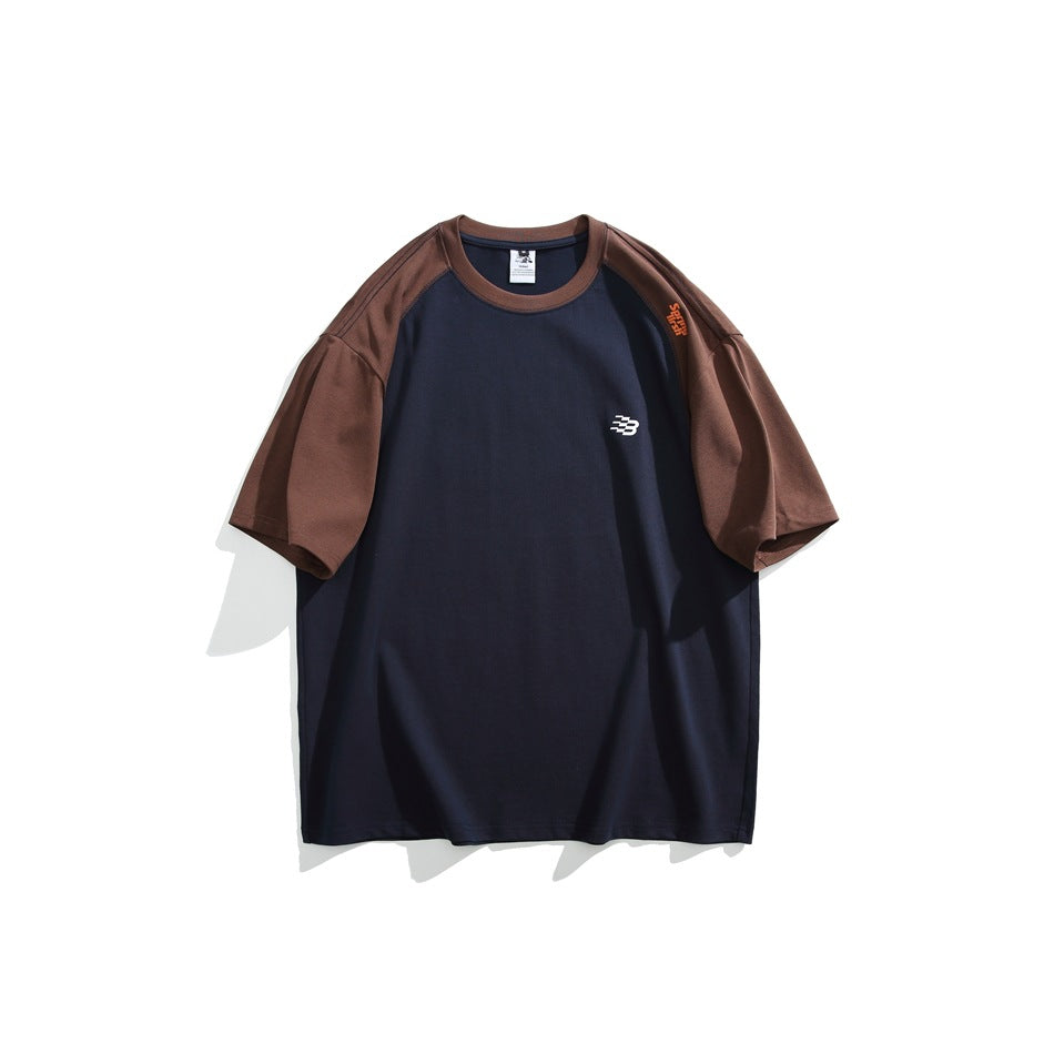 Navy short-sleeve raglan T-shirt with brown sleeves and collar and a small white chest logo, flat front view