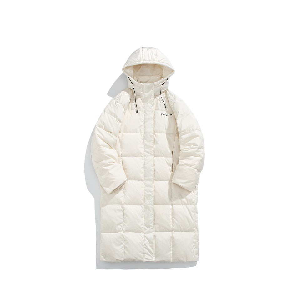 Cream long hooded quilted puffer coat, front view on a plain white background, with black hood drawcords